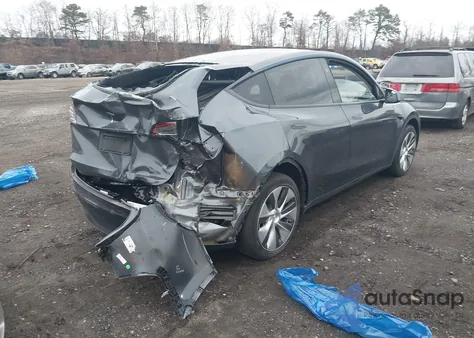 2023 Tesla Model Y Rwd from USA, damaged, VIN 7SAYGDED3PF966665